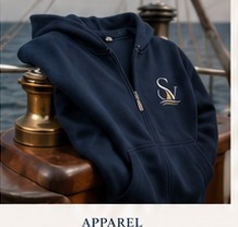 Navy St Vincent apparel arranged beside yacht hardware